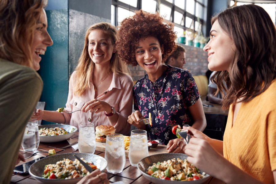 Four friends eating out